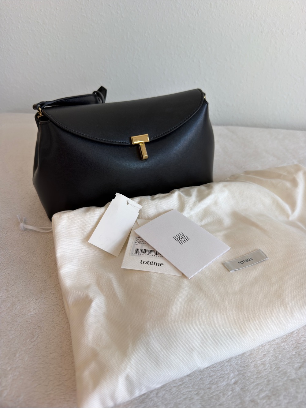 Toteme T Lock Clutch Palmellata